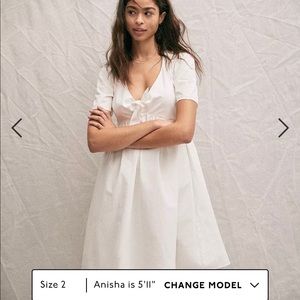 White 100% cotton structured tie-front babydoll mini dress